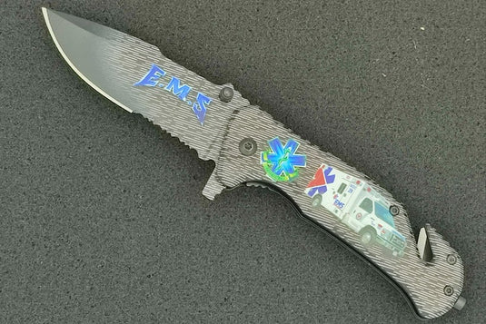 coltello chiudibile emergenza con frangivetro tagliacinture e lama cm. 8,2 con clip di fissaggio stampa fotografica 3d EMS SOCCORSO SANITARIO 