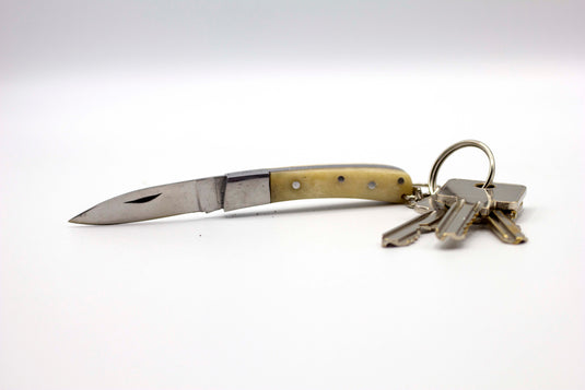 coltello tipo pattada manico osso con portachiavi lama cm. 5 