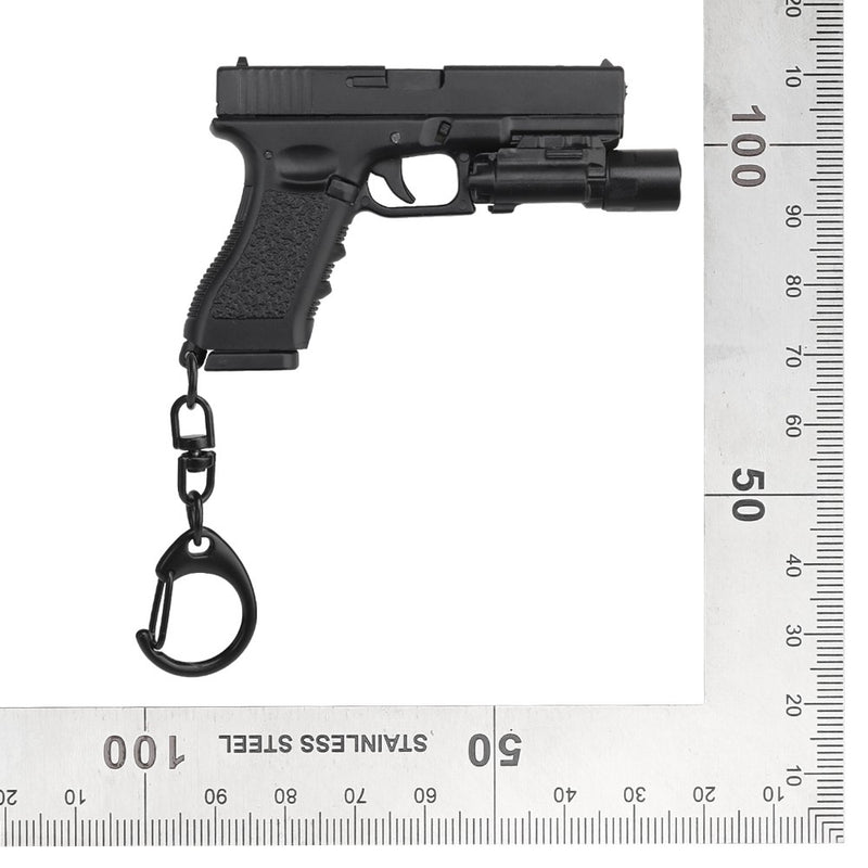 Carica immagine in Galleria Viewer, portachiavi pistola glock 17 con torcia 
