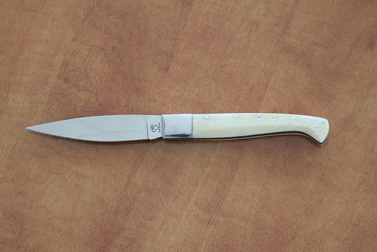 Coltello pieghevole pattada  lama cm 10manico corno bianco 