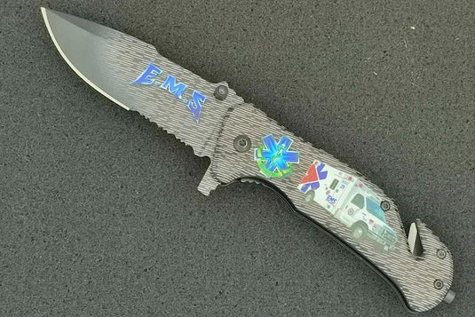 coltello chiudibile emergenza con frangivetro tagliacinture e lama cm. 8,2 con clip di fissaggio stampa fotografica 3d EMS SOCCORSO SANITARIO 